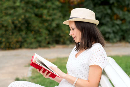 Girl Communicates in Messenger Via Video Communication Watches Video in Social Networks Holds...