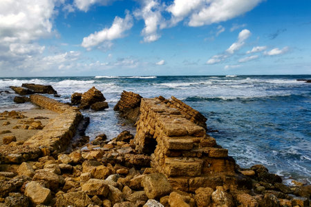 Ruins of ancient city on Mediterranean coast. Colorful seascape in sunny weather at coastの写真素材