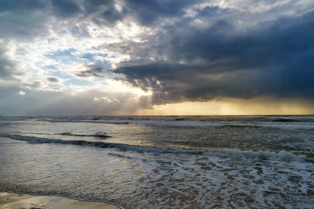 Dramatic stormy dark cloudy sky over at Herzliya Beach. natural background photo. Sunset at sea....