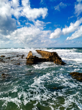 Ruins of ancient city on Mediterranean coast. Colorful seascape in sunny weather at coastの写真素材