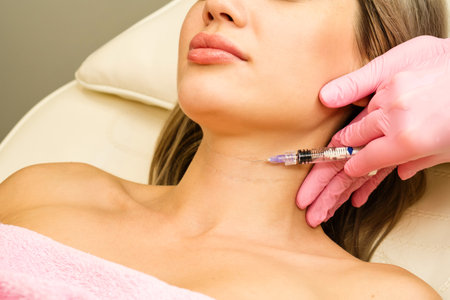 Biorevitalization neck skin rejuvenation for female patient in beauty salon. Mesotherapy injection...