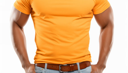 Frontal cropped view of a fit man in an orange T-shirt mockup and jeans with a brown beltの素材