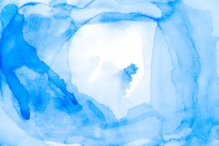 Abstract watercolor painting with cool blue hues cradling a soft white space. Icy Blue Embraceの写真素材