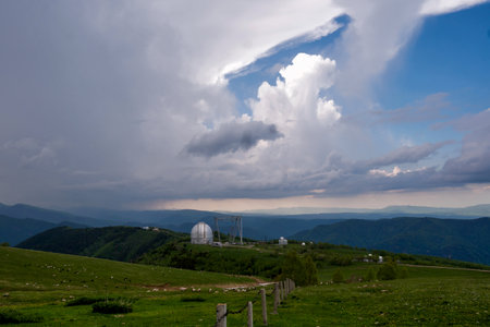 Large observatory dome with a metal crane structure. BTA 6. Large Azimuth Telescope. View of Astrophysical observatory of Russian Academy of Sciences. Caucasus Scenic landscapeの写真素材