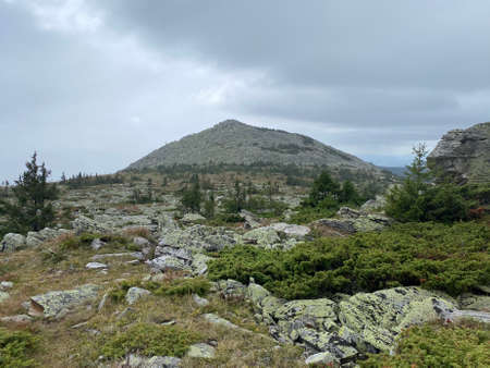 Autograph plateau. View of the Kruglitsa mountain from the northern side of the slope. Taganay national Park. Zlatoust city. Chelyabinsk region. South Ural. Russiaの写真素材