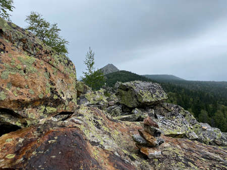 Mitkini rocks. View of the Otkliknoy ridge. The popular tourist destination. Taganay national Park. Zlatoust city. Chelyabinsk region. South Ural. Russia.の写真素材