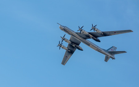 St. Petersburg, Russia - April 25, 2015: Strategic bomber Tu-95 "Bear", in flight, Aviation parade at the air show.のeditorial素材