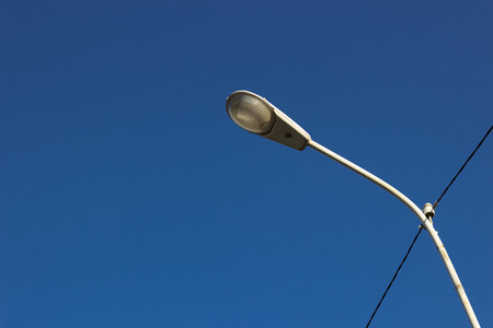 Streetlight on blue sky