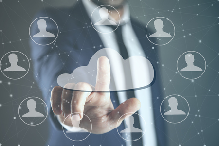 man touching in cloud and people in screenの写真素材