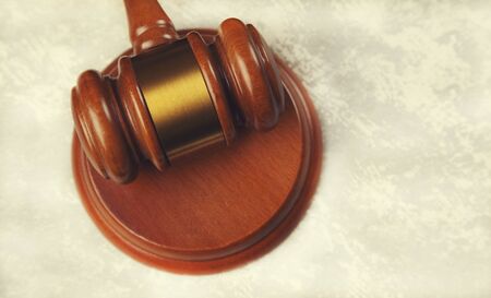wooden judge on the white table background
