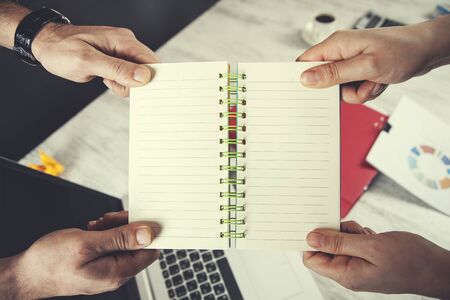 two business people working in office deskの写真素材