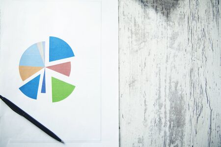 pen on the graph paper on tableの写真素材