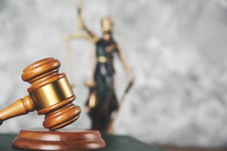 book with justice lady and judge on tableの写真素材