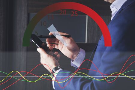Man hand holding the smartphone with speedometer