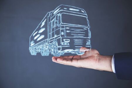 young business man hand truck in screenの写真素材