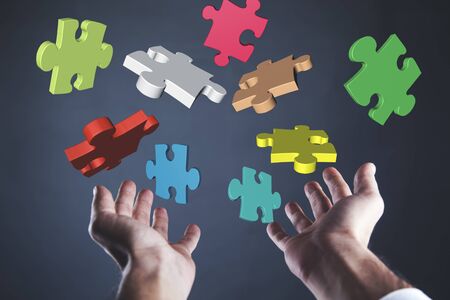 young man hand pouzzle in the screenの写真素材