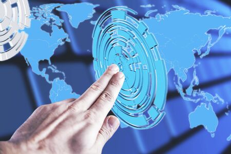 Businessman pressing abstract digital button on blurry background.の写真素材