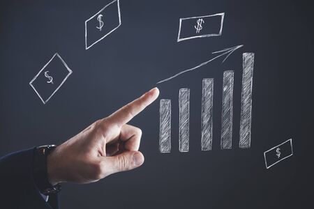 man finger with success graph in board