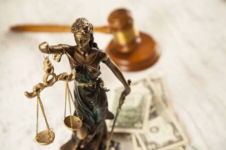 judge and justice lady and money on deskの写真素材