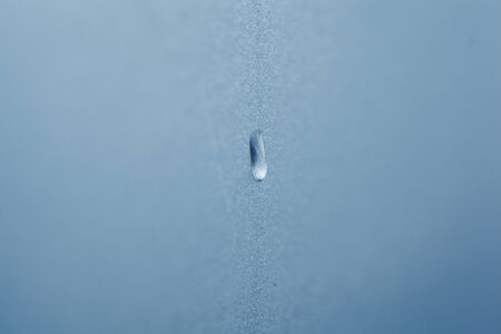 the water in the blue glass background