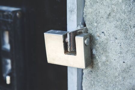 metal lock in garage in the street