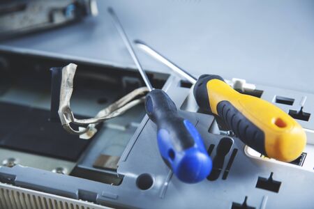 worker man repair computer on the deskの写真素材