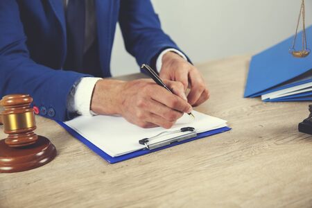 man working with justice lady and judge on deskの写真素材