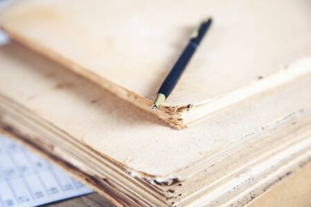 old document and pen on the desk