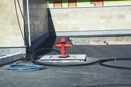 red fire hydrant on gray ground backgroundの写真素材