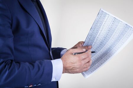 young business man hand pen and document 