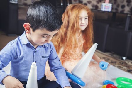 baby playing in toys in the homeの写真素材