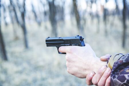 in the officer hand gun in nature