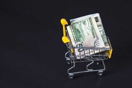  money on basket on the table backgroundの写真素材