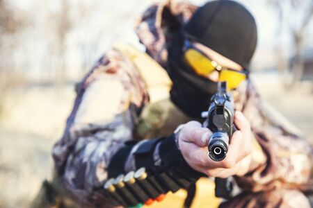 in the officer hand Â weapon in natureの写真素材