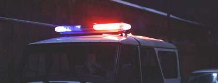 police car light at the night streetの写真素材