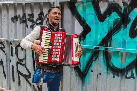 ISTANBUL, TURKEY - MARCH 23: The busker playing accordion on March 23, 2015 in Istanbul