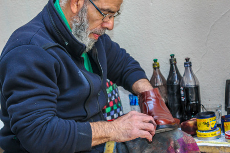 ISTANBUL, TURKEY - APRIL 3: Shoeshine man on April 3, 2015 in Istanbulのeditorial素材