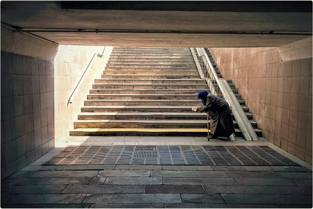 Silhouette of poor grandmother in central Moscowの素材