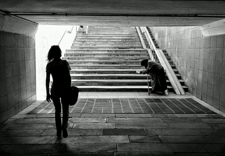 Silhouette of poor grandmother in central Moscowの素材