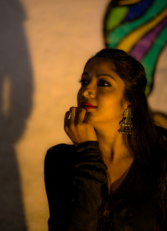 a beautiful classical dancer posing on a streetの写真素材