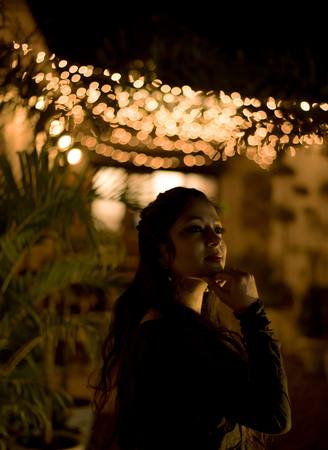 a beautiful classical dancer posing on a streetの写真素材