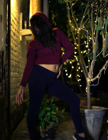 Hot flexible toned girl posing in the streetsの写真素材