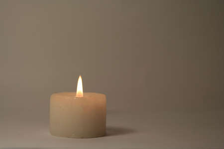Candle in the darkの写真素材