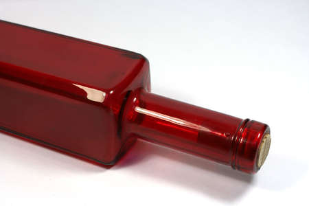 A detail of a red bottleの写真素材