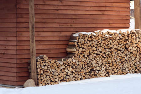 A woodpile near the wallの写真素材