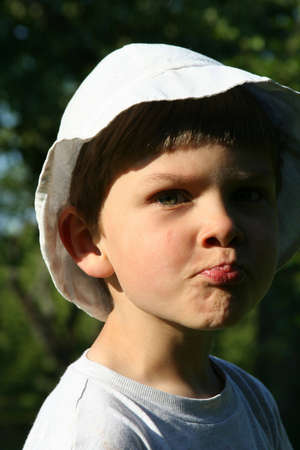 A child with white hat