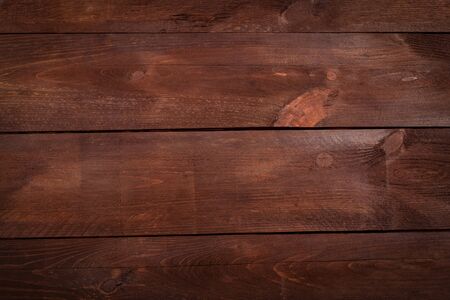 Natural brown wooden table with a rough texture. Can be used for floors, walls, ceilings and furniture.の写真素材