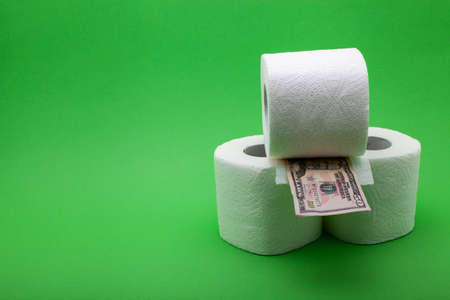 man buy a lot of toilet paper rolls. Coronavirus covid-19 panic concept, stocking up toilet paper for home quarantineの写真素材