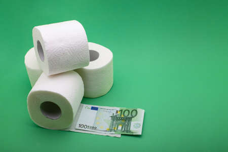 man buy a lot of toilet paper rolls. Coronavirus covid-19 panic concept, stocking up toilet paper for home quarantineの写真素材