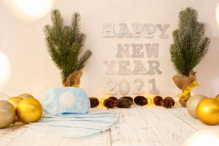 Christmas Card Happy New Year 2021 medical masks, balls, bumps, Christmas trees